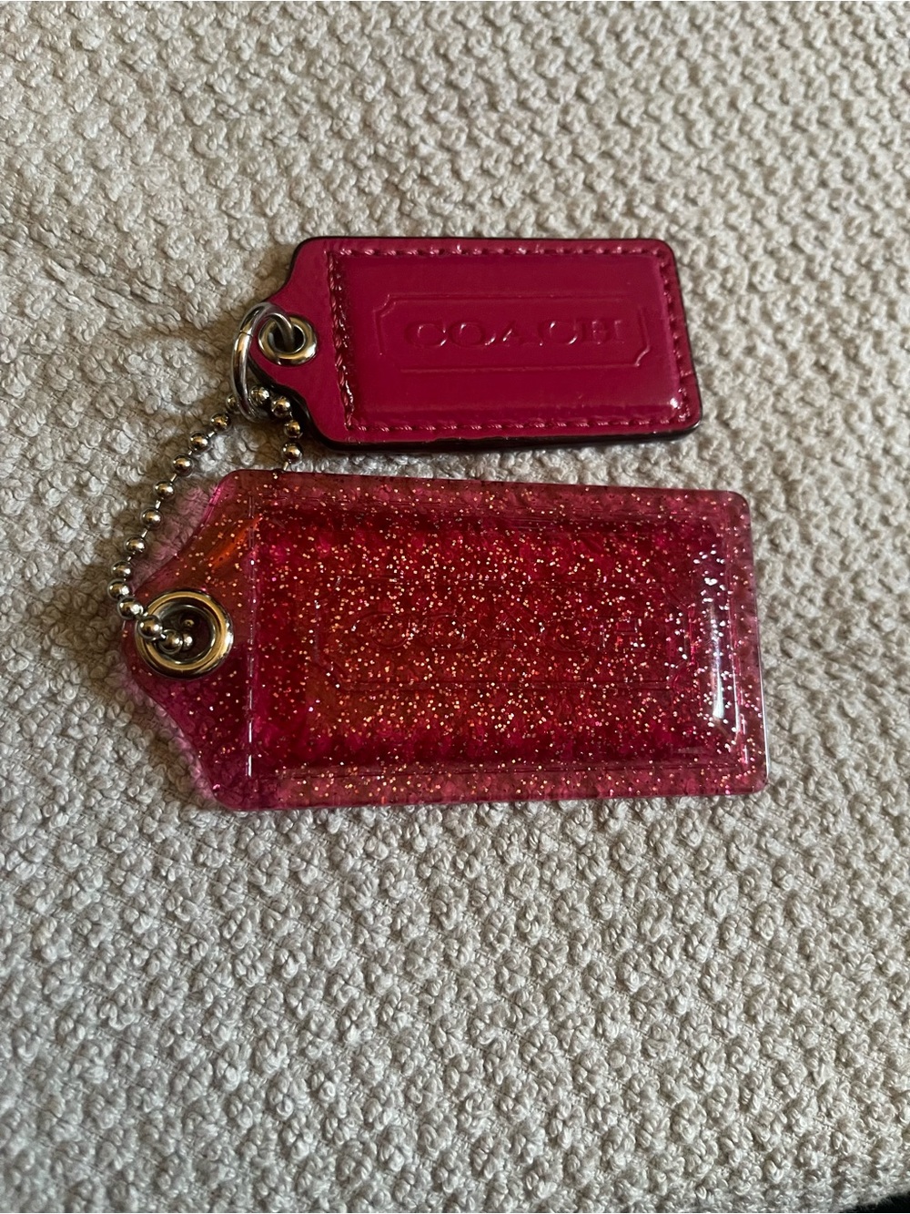 Choice of Coach Glitter & Leather Poppy Hangtags